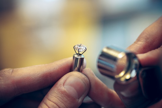 specialist checking diamond